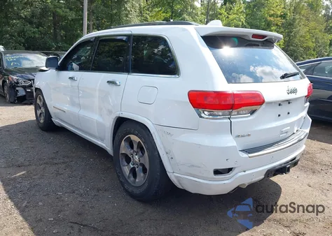 2014 Jeep Grand Cherokee Overland из США, поврежденный, VIN 1C4RJFCG7EC380766